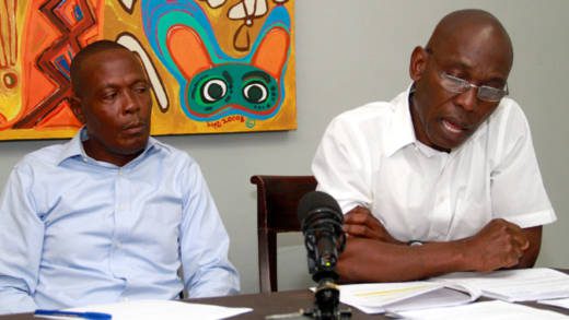 Otto Sam, left, and his lawyer, Jomo Thomas, at Tuesday's press conference. (iWN photo)