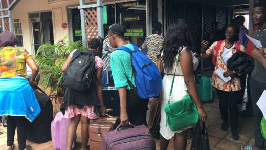 All Saints University student prepare to board a ferry from Kingstown to Dominica on Wednesday. (iWN photo)