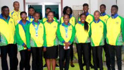 Some members of the CARIFTA team and team administrators at Argyle International Airport on Tuesday. (iWN photo)