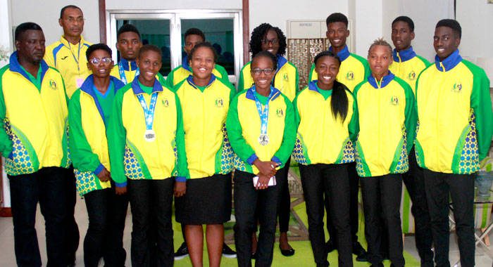 Some members of the CARIFTA team and team administrators at Argyle International Airport on Tuesday. (iWN photo)