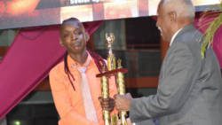 Senior Sportswoman of the Year 2017, Linda Mc Dowall receives her trophy from Governor General Sir Frederick Ballantyne. (Photo: NLA of SVG/Facebook)