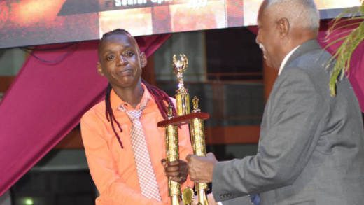 Senior Sportswoman of the Year 2017, Linda Mc Dowall receives her trophy from Governor General Sir Frederick Ballantyne. (Photo: NLA of SVG/Facebook)