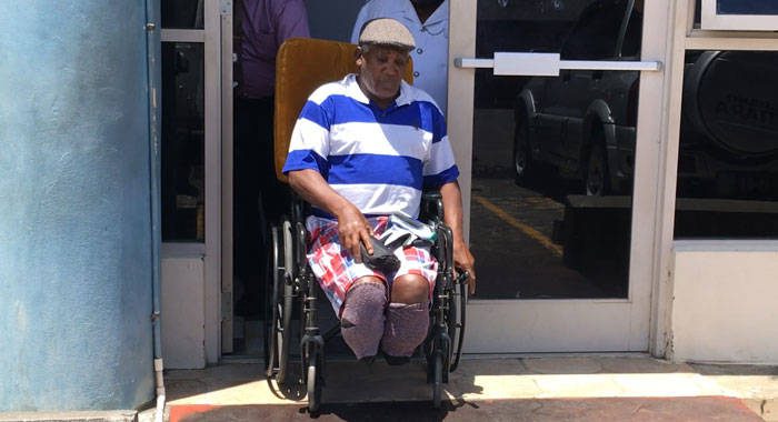Andrew Myers of Buccament Bay leaves the Kingstown Magistrate's Court in his wheelchair for prison in May 2018. (iWN photo)