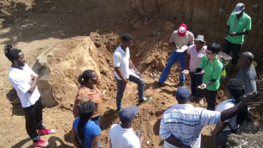 Dr. Chien-Hui Syu, a Taiwanese expert on soil analysis, interprets soil profile during the field training. 