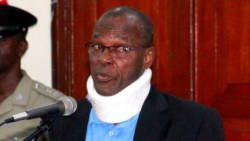 Member of Parliament for West Kingstown, Daniel Cummings wearing the neck collar in Parliament on May 24. (iWN photo)