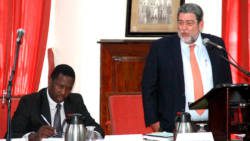 Prime Minister Ralph Gonsalves, right, and Attorney General Jaundy Martin in Parliament on Thursday. (iWN photo)