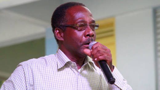 Anthony Boatswain of Grenada's ruling New National Party speaks at the NDP's convention in Greiggs on Sunday. (iWN photo)