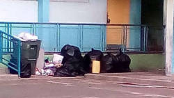 The NDP says that it was not told on Tuesday about the garbage that was cited as the reason for the closure of the school on Wednesday. (iWN photo)
