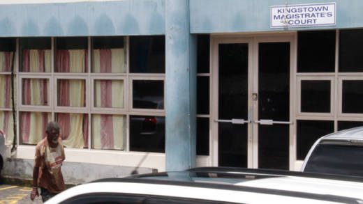 A man, said to be mentally ill, walks past the Kingstown Magistrate's Court on Tuesday. (iWN photo)