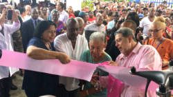 Georgetown resident Myrna Morris, second right, cuts the ribbon to official open the Modern Medical and Diagnostic Centre in Georgetown on Monday, also in photo are, Cuba Ambassador to SVG Vilma Reyes Valdespino, Minister of Social Development, Frederick Stephenson, and Prime Minister Ralph Gonsalves.