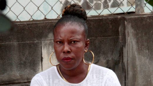The accused, Margaret “Ole Gyal” Smith, outside the Serious Offences Court in Kingstown on Monday. (iWN photo)