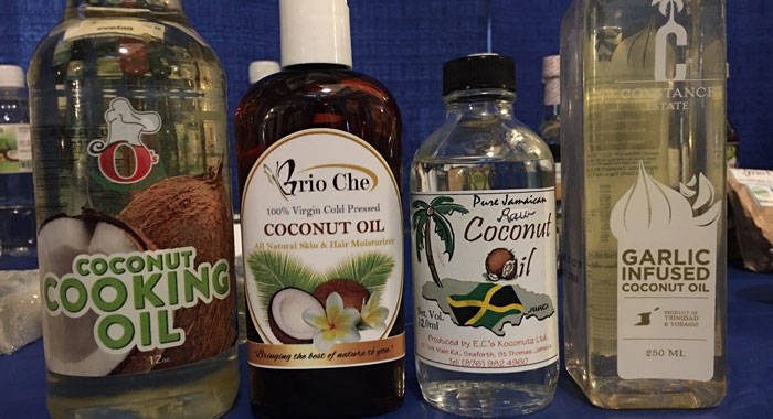 Coconut oil from across the Caribbean on display at Caribbean Week of Agriculture in Barbados. (iWN photo)