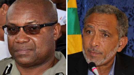 Acting Commissioner of Police Colin John, left, and Opposition Leader, Godwin Friday.