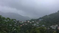 Heavy clouds over Rillan Hill and other Buccament Valley communities as rain continued Wednesday morning. (iWN photo)