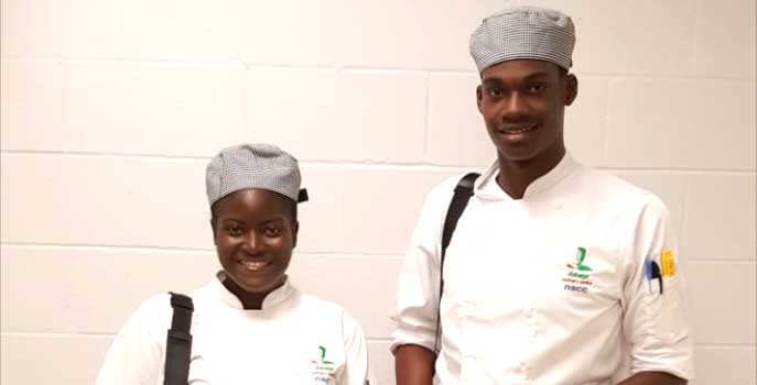 SVGCC students, Sarine and Xavier in full chef gear at the Akerley Campus, Nova Scotia Community College, Nova Scotia, Canada.