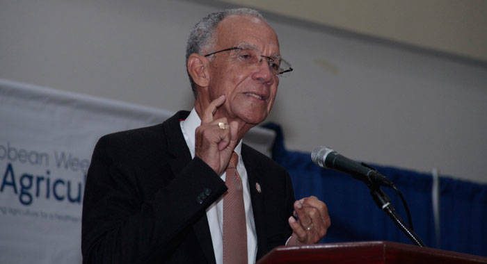 Trevor Hassell, president of the Healthy Caribbean Coalition, speaking at the beginning of Caribbean Week of Agriculture on Monday. (iWN photo)