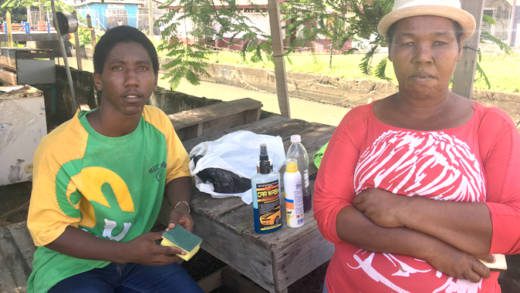 After living n the streets for four months, Inola Hayne and her children have a roof over their heads. She is seen her with her 18-year-old son, Junior Haynes, who is balancing studies with trying to make a living washing cars in Kingstown. (iWN photo) 