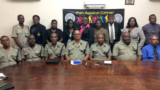 Members of the Sexual Offences Unit and other police personnel, including acting COmmissioner of Police, Colin John (3rd from right, front row) at Wednesday's launch. (iWN photo)