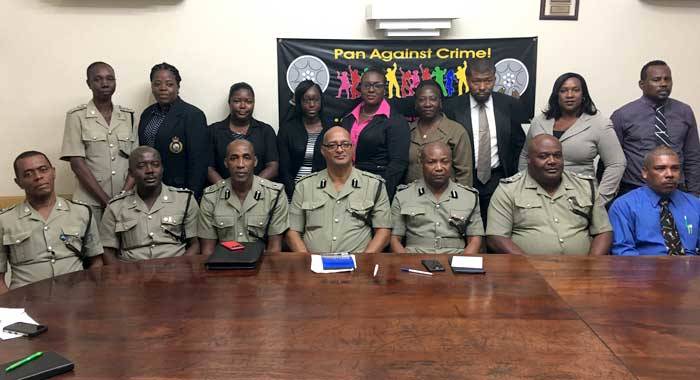 Members of the Sexual Offences Unit and other police personnel, including acting COmmissioner of Police, Colin John (3rd from right, front row) at Wednesday's launch. (iWN photo)
