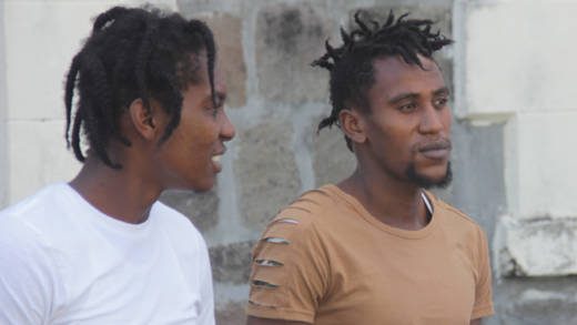 Sex offenders Askey Roberts (left) and Kenny Richards on their way to prison in December. The judge suspended their two -year jail term last week. (iWN photo)