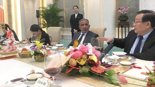 Opposition Leader Godwin Friday, centre in talk in China. (NDP Photo)
