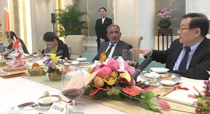 Opposition Leader Godwin Friday, centre in talk in China. (NDP Photo)