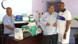 Neil Corke, left, Prime Minister Ralph Gonsalves, centre, and Permanent Secretary in the Ministry of Health, Cuthbert Knights. (Photo: API)