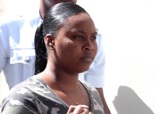 The accused, Suranie Graham leaves the Serious Offences Court after her arraignment on Monday. (iWN photo)