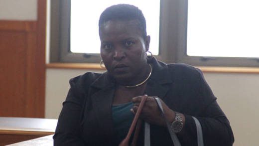 Ashanti Caesar-Benjamin prepares to enter the courtroom on Tuesday. (iWN photo)