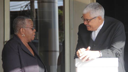 Lead counsel in the Central Leeward petition, Douglas Mendes, right, chat with former supervisor of elections, Sylvia Findlay-Scrubb on Feb. 11, 2018, the first day of the trial. (iWN photo)