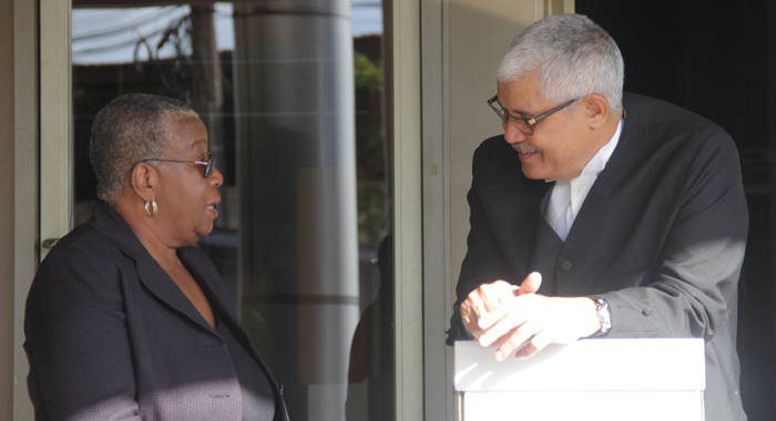 Lead counsel in the Central Leeward petition, Douglas Mendes, right, chat with former supervisor of elections, Sylvia Findlay-Scrubb on Feb. 11, 2018, the first day of the trial. (iWN photo)