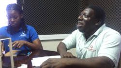 Athlete Lavern Allick, left, and host Terrence Davis. 