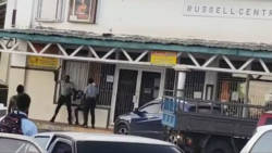 A scene from the video in which the youth is repeatedly struck in the head by a police officer.