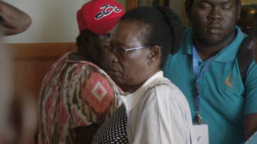 Esla Sam leaves the court after being cross examined on Wednsday. (iWN photo)