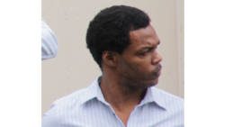Allan Wilson is escorted to prison on Friday. (iWN photo)