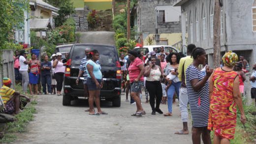 Onlookers at the scene in Penniston on Tuesday. (iWN photo)