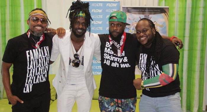 From left: Soca stars Machel Montano, Skinny Fabulous, Bunji Garlin, and Dominican Dada, who produced the music for the song, at Argyle International Airport on Wednesday. (iWN photo)