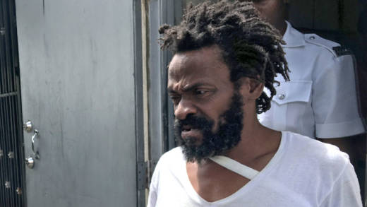 Wayne Marshall is escorted to prison after his sentencing on Monday. (iWN photo)