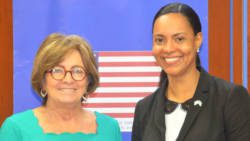 Carla James (right) meets with U.S. Ambassador Linda Taglialatela before her departure. 