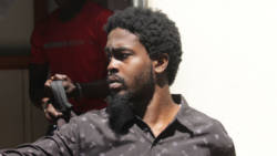 Murder accused, Kesean Cain leaves the Serious Offences Court on Tuesday. (iWN Photo)