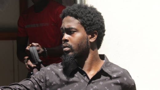 Murder accused, Kesean Cain leaves the Serious Offences Court on Tuesday. (iWN Photo)