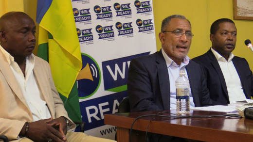 Leader of the Opposition, Godwin Friday, centre, and the petitioners, Lauron “Sharer” Baptiste, left, and Benjamin “Ben” Exeter at the press conference on Thursday. (iWN photo)