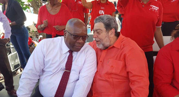 Prime Minsiter of St. Kitts and Nevis, Timothy Harris, left, and Prime Minister of St. Vincent and the Grenadines, Ralph Gonsalves, speaking on the platform at the ULP rally in Kingstown last Thursday. (Photo: Lance Neverson/Facebook)