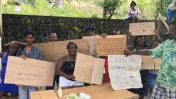 Protesters near the Buccament Polyclinic on Tuesday. (iWN photo) 