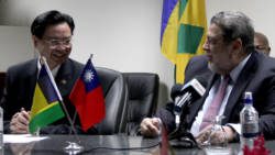 Taiwan’s Minister of Foreign Affairs, Jaushieh Joseph Wu, left, and Prime Minister of SVG Ralph Gonsalves at Wednesday's press briefing in Kingstown. (iWN photo)
