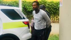 The accused, Rohan Williams, being escorted to court. (Photo: BVI Platinum News)