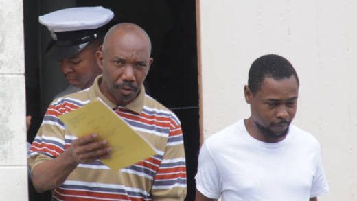 Sex offenders Sheldon John, right and Deron Henry are escorted back to prison to continue their sentences on Tuesday, after they each withdrew their appeal. (iWN photo)