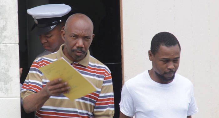 Sex offenders Sheldon John, right and Deron Henry are escorted back to prison to continue their sentences on Tuesday, after they each withdrew their appeal. (iWN photo)