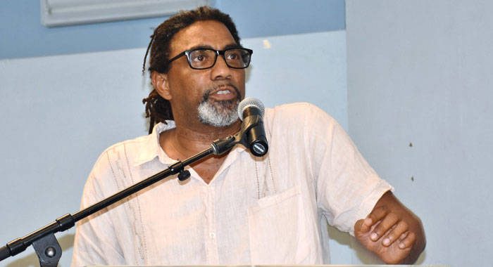 University of the West Indies lecturer Tennyson Joseph delivers his review of St. Vincent and the Grenadines’ Minister of Finance, Camillo Gonsalves’ book Globalised. Climatised. Stigmatised. in Calliaqua on Monday. (Photo: Lance Neverson/Facebook)
