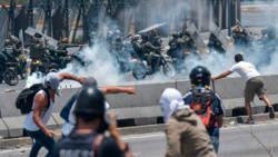 Thousands of Venezuelans took to the streets in Caracas heeding opposition Juan Guaidó’s call on Wednesday. (Photo: Matias Delacroix/Agence France-Presse — Getty Images)